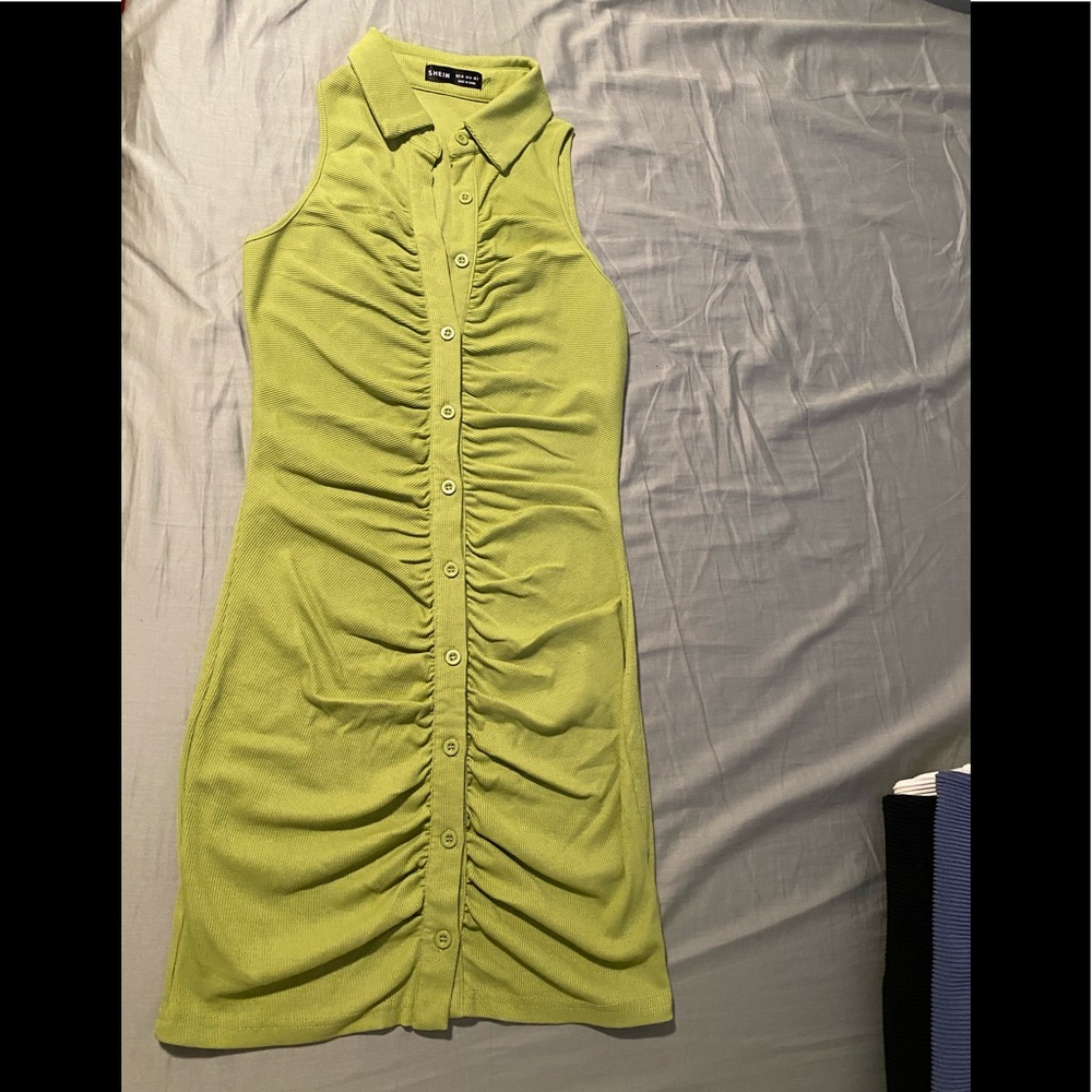 Green ruched form fitting dress
